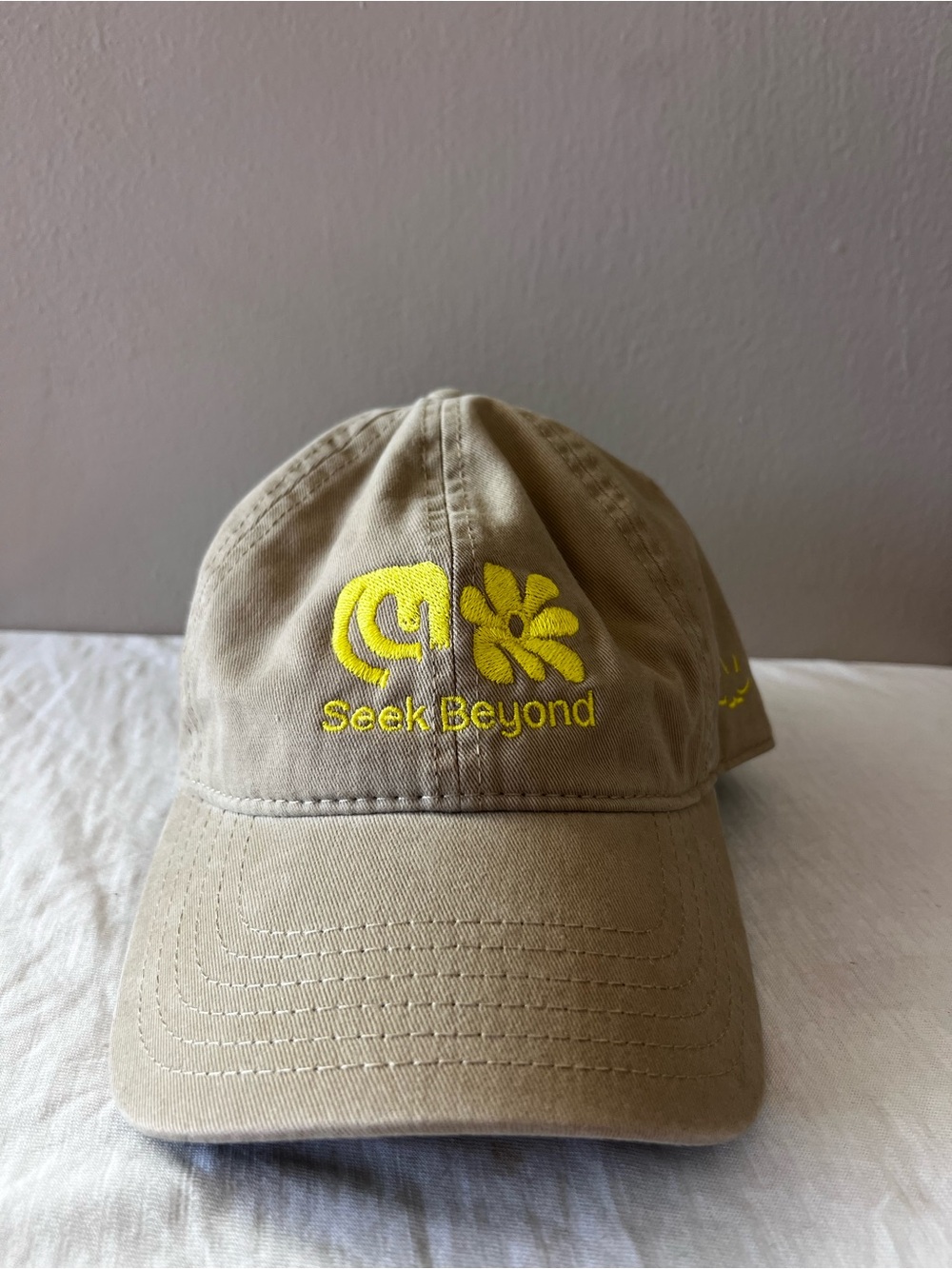 Seek Beyond Tan Baseball Cap with Yellow Logo